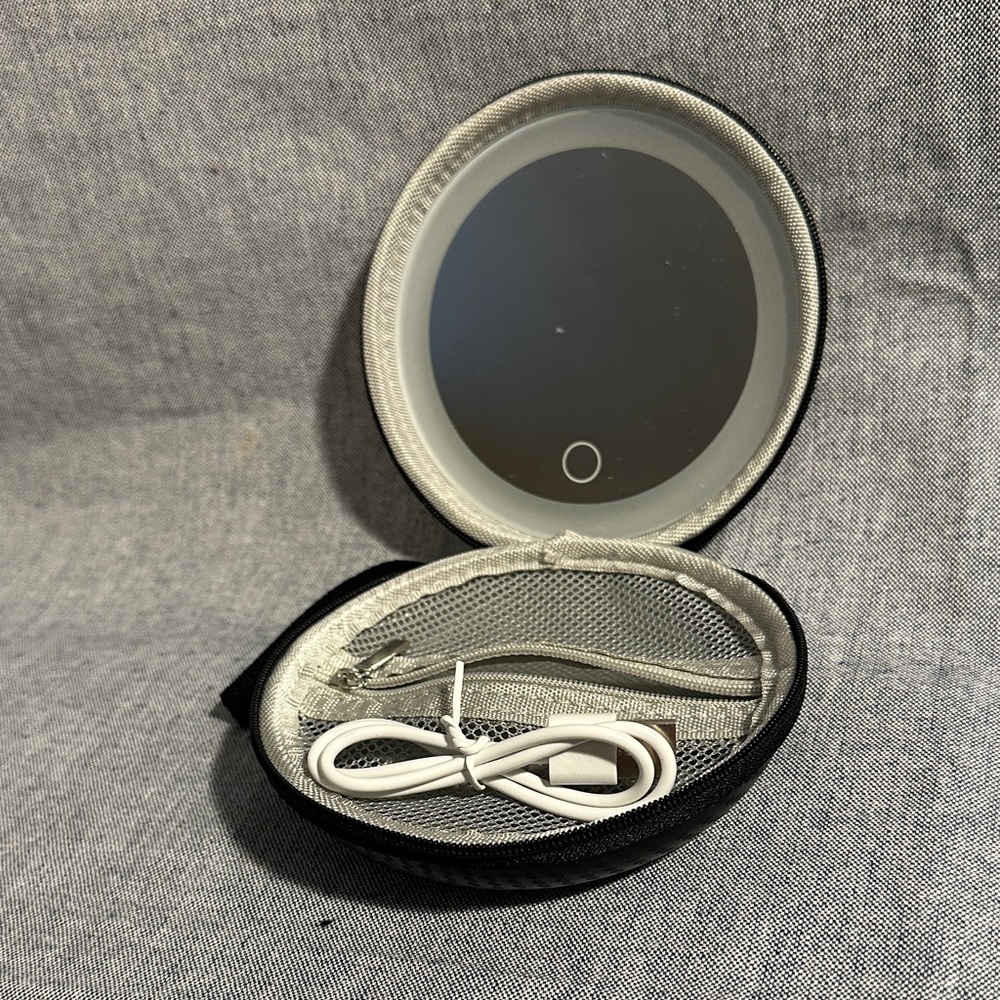Compact Round Accessory Case in Light Gray with USB Cable
